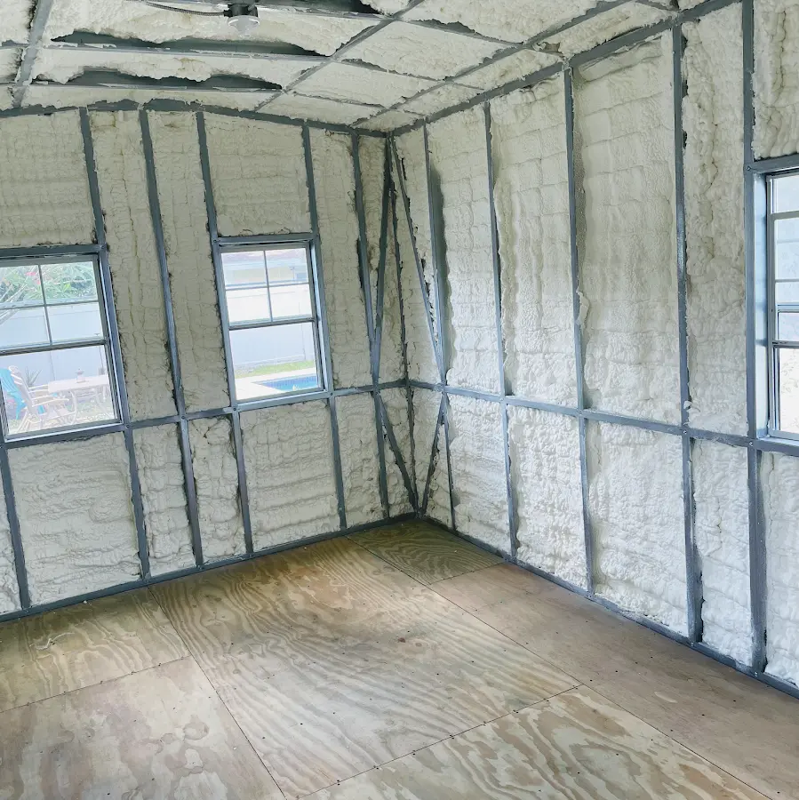 Closed-cell spray foam insulation applied to wall cavities in a residential project in Avondale